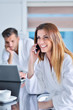 © FS-Stock - woman wearing a white bathrobe with laptop