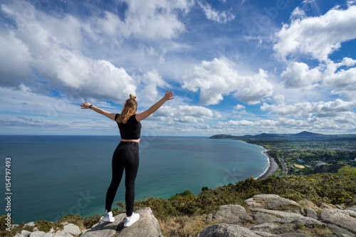 Young Beautiful Girl Female Model Photographer Posing On Top Of