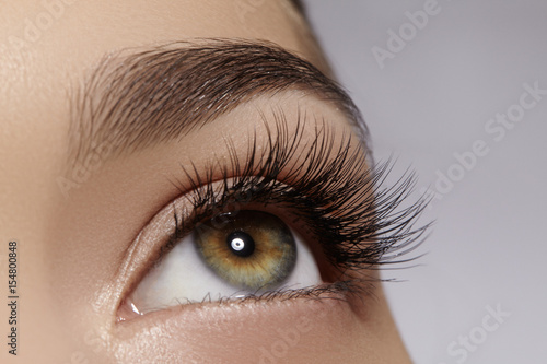 Fotografie, Obraz Beautiful female eye with extreme long eyelashes, black liner makeup