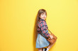 © Africa Studio - Cute little girl on color background. Fashion concept