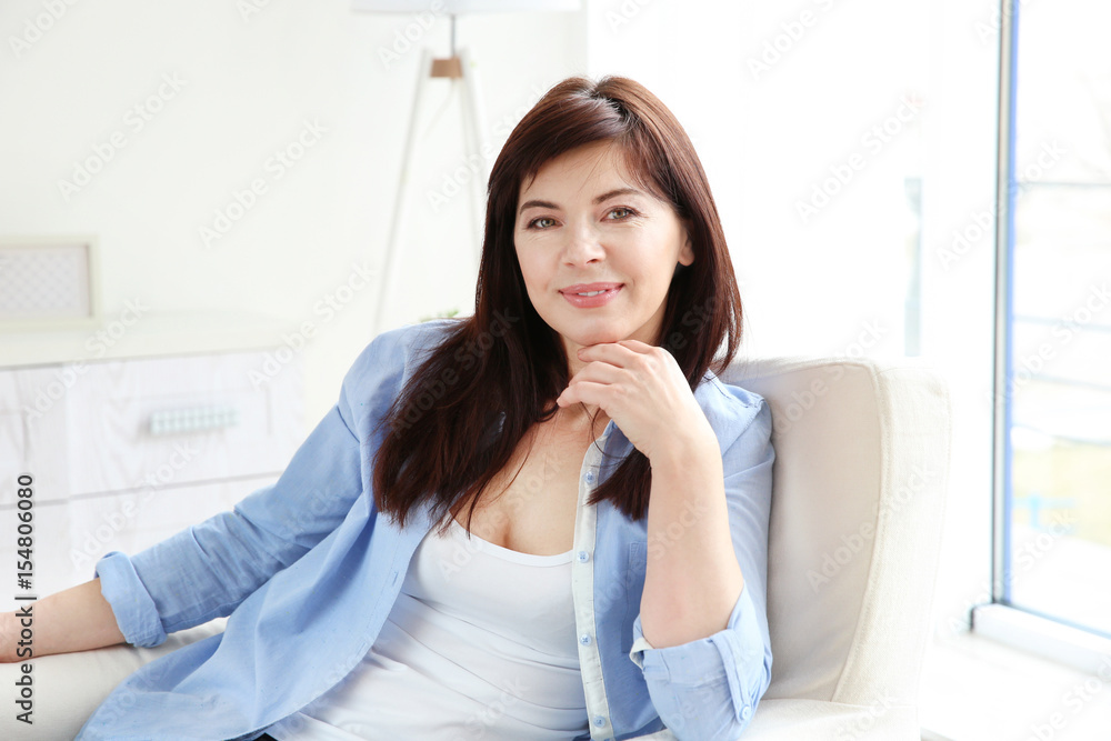 Beautiful mature woman at home