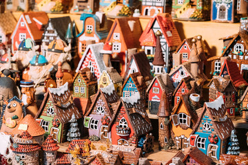 Wall Mural - Traditional Souvenirs Small House Toys At European Market. Funny