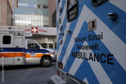 Ambulances Are Parked Outside The Emergency Room Entrance At