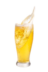 Wall Mural - Beer splashing out of glass isolated on white background.