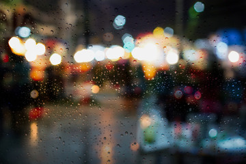 Wall Mural - drop on window car with the rainy night city