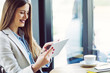© LStockStudio - Young Businesswoman Using Tablet