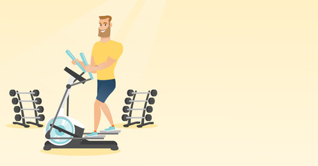 Wall Mural - Man exercising on elliptical trainer.