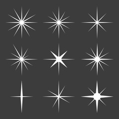 Wall Mural - vector set of sparkle lights stars.