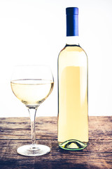 Wall Mural - white wine bottle and glass - italian food and drink