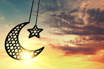 Wall Mural - Ramadam Kareem moon and star against sunrise/sunset background. 3D Rendering