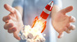 Businessman holding red rocket in his hand 3D rendering