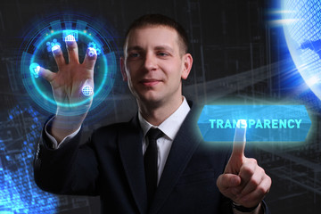 Wall Mural - Business, Technology, Internet and network concept. Young businessman working on a virtual screen of the future and sees the inscription: Transparency