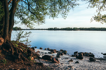 Wall Mural - Serene river and a beautiful sunset