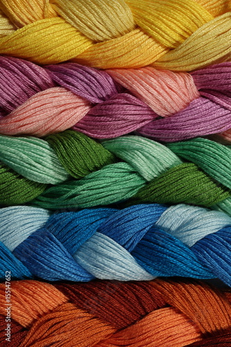 Fotografia, Obraz The pigtails from multicolored threads for embroidery