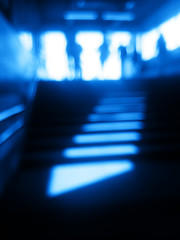 Wall Mural - Diagonal blue metro station stairs bokeh background