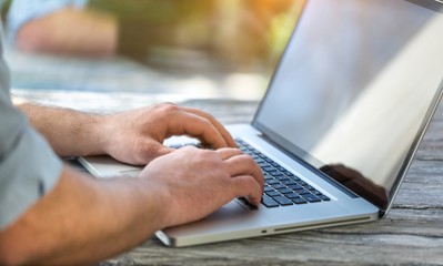 Business man using laptop.