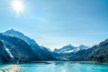 Wall Mural - alaska cruise travel landscape. glacier bay johns hopkins glacier on sunny day with sun flare. summe