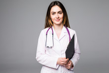 Woman Doctor Or Nurse With Clipboard With Blank Paper Isolated On Grey Background