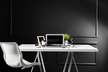 Poster - Office leather desk table with computer, supplies