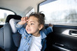 © LIGHTFIELD STUDIOS - Little adorable african american girl sitting in car