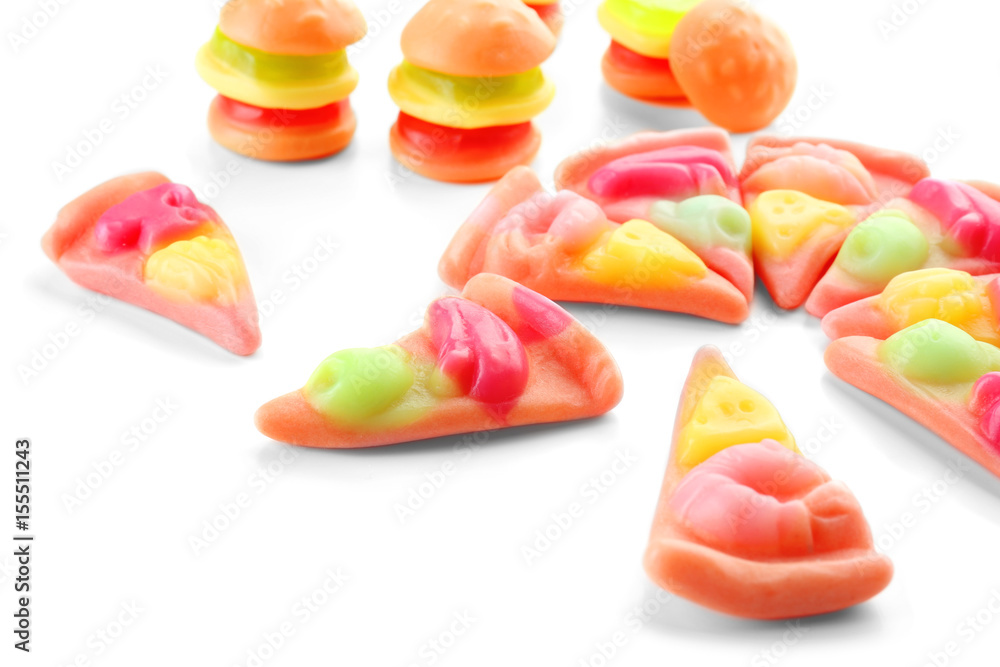 Composition of tasty jelly candies on white background