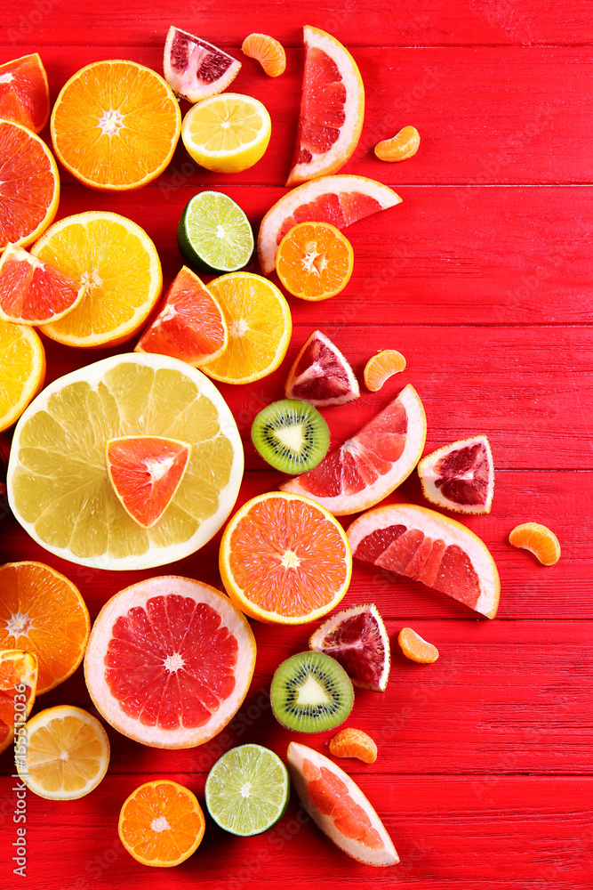 Beautiful composition with citrus fruits on wooden background
