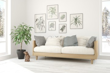 White room with sofa and winter landscape in window. Scandinavian interior design. 3D illustration