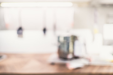 Poster - Blur abstract background of housewares on countertop in kitchen with bokeh light