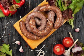 Sticker - Fresh raw sausages on cutting board