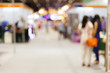 © sutichak - people customer shopping in hall exhibition trade fair, image blur used background