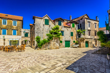 Wall Mural - Hvar architecture square. / Old stone architecture in town Starigrad, Island Hvar scenery.