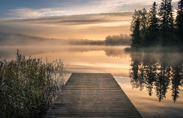 scenic landscape with morning mood and sunrise at autumn in finland