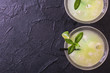 Classic daiquiri cocktail with lime, ice and mint