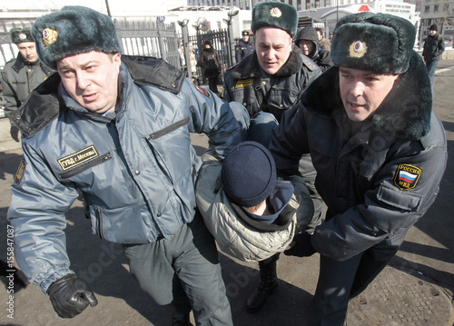 Russian Interior Ministry Officers Remove An Activist From