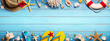 Leinwandbild Motiv Beach Accessories On Blue Plank - Summer Holiday Banner
