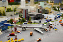 City In Miniature. Model Of Push Back Airplane In The Airport Apron. Tlit Shift Effect.