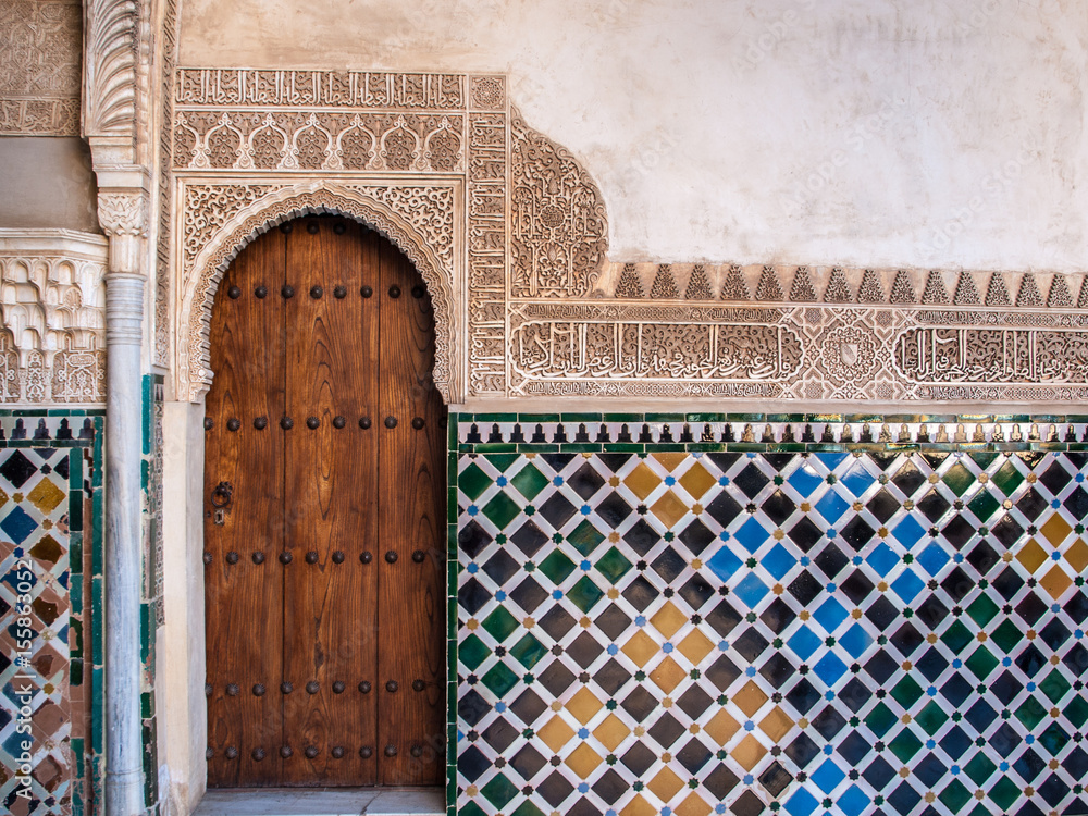 Detail of a door and ornament of Alhambra, Granada, Spain - obrazy, fototapety, plakaty 