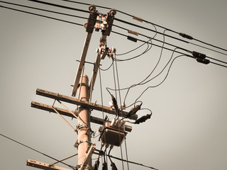 Electric pole with electric transformers and electrical cables in Osaka city, Japan