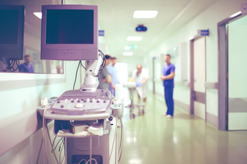 Wall Mural - Group of doctors speaking in the hospital