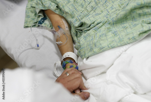 Doctor Yeh Holds The Hand Of Patient Analy Navarro In The