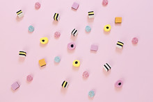 Jelly Colored Candy Scattered On The Pink Background, Abstract Background Concept