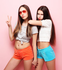 emotions, people, teens and friendship concept - two young teen 