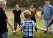 © Rawpixel.com - Group of people holding hand together in the park