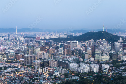 Stampa su Tela Night falls above the Seoul, South Korea capital city