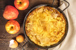 Apple puff pancake pie with apples and egg shells