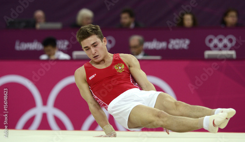 David Belyavskiy Of Russia Competes In The Floor Exercise During