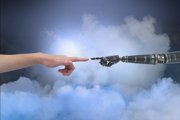 Human and robot touching their fingers in cloudy background
