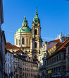 A street in the "Lesser town" district. Church of Saint Nicholas . Area of the Old City. Prague, Czech Republic.