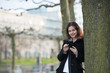 © victorpr - woman with smartphone in park