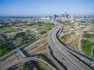 Wall Mural - Aerial view Houston downtown and interstate 69 highway with massive intersection, stack interchange and elevated road junction overpass at early morning from the northeast side of Houston, Texas, USA